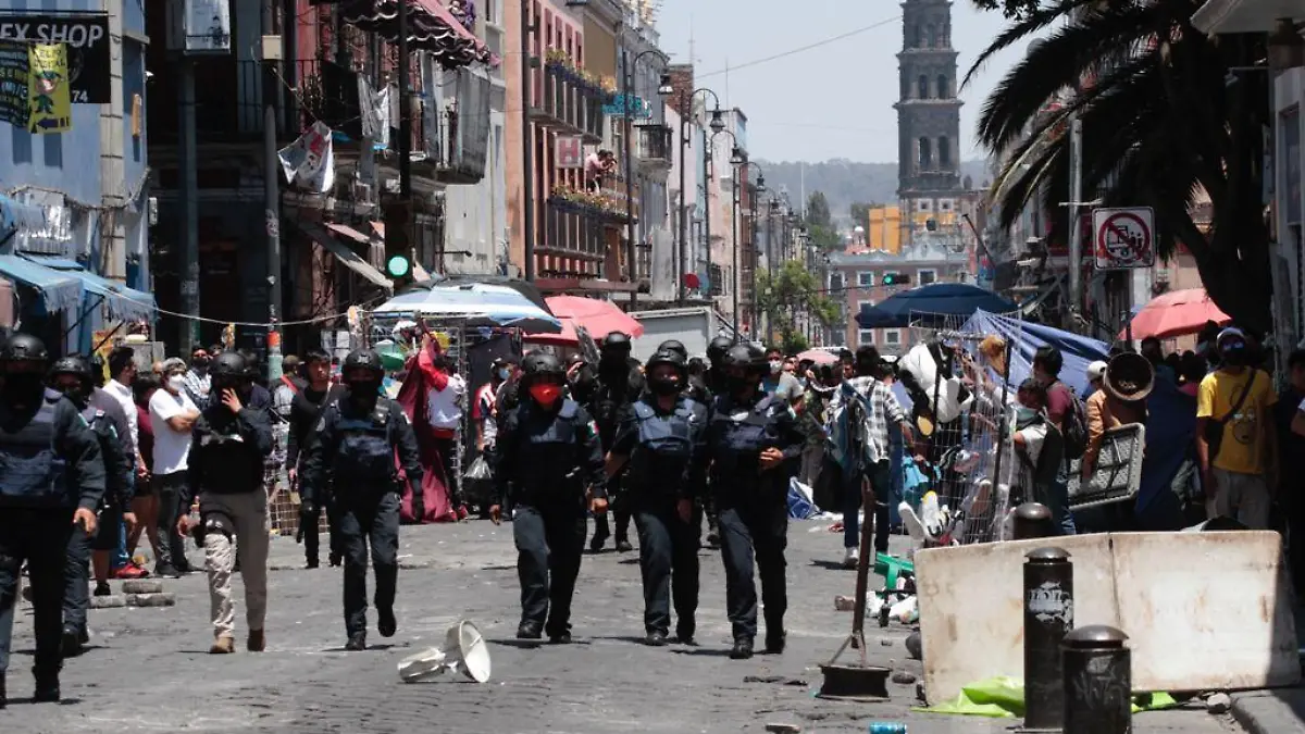 RIÑA COMERCIANTES CH PUEBLA